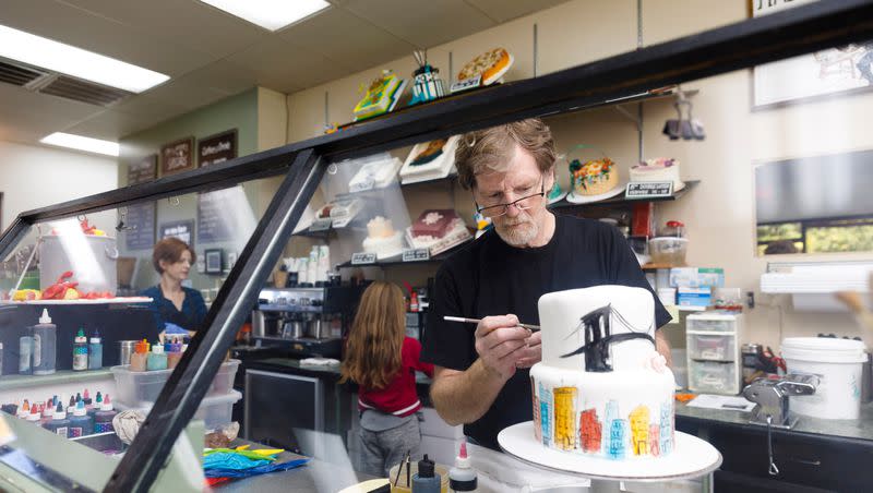 Jack Phillips, owner of Masterpiece Cakeshop in Lakewood, Colorado, decorates a cake for a client on Sept. 21, 2017.