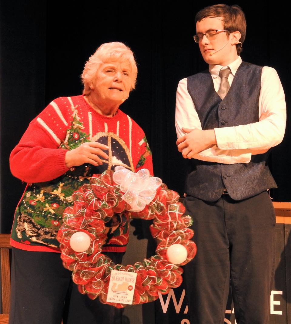 Kathy Reid and Andrew Clantz in a scene from "The Ghost of Christmas Present" at Ridgewood High School. A special presentation of the play and "Last Stop Til Christmas" was part of the annual senior citizen luncheon held recently at the school. Reid has helped in the past with spring musical auditions and is a member of the Coshocton Footlight Players.