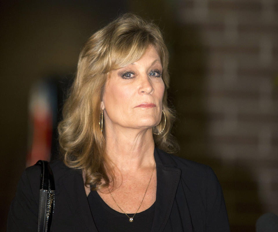 FILE - Judy Huth appears at a news conference outside the Los Angeles Police Department's Wilshire Division station in Los Angeles on Dec. 5, 2014. Eleven months after he was freed from prison, 85-year-old Bill Cosby will again be the defendant in a sexual assault proceeding, this time a civil case in California. Judy Huth, who is now 64, alleges that in 1975 when she was 16, Cosby sexually assaulted her at the Playboy Mansion. (AP Photo/Anthony McCartney, File)