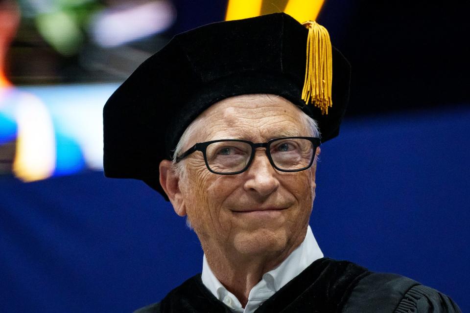 Bill Gates stands onstage just before receiving an honorary doctorate from Northern Arizona University during the spring 2023 commencement at the NAU Skydome on May 13, 2023, in Flagstaff.