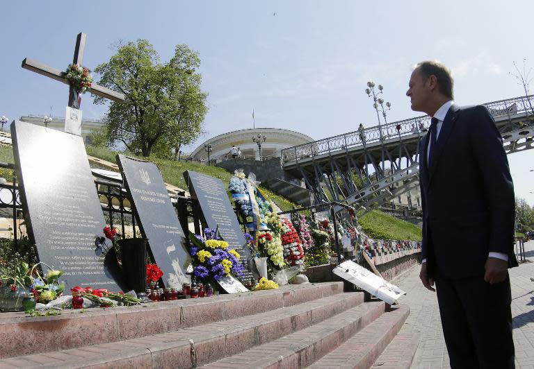 European Council President Donald Tusk visits the memorial for the slain "Heavenly 100" in memory of people killed during Euromaidan events in Kiev, on April 27, 2015