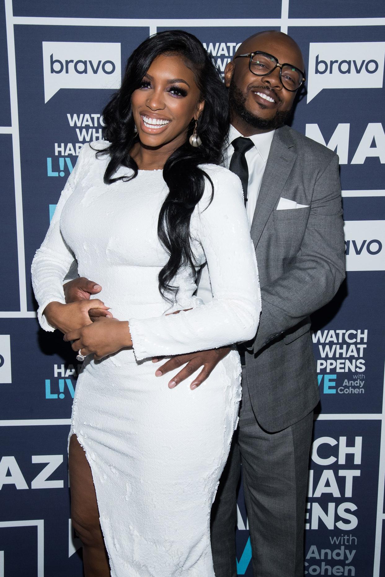 Porsha Williams posing with Dennis McKinley at 'Watch What Happens Live!'