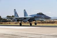 CAPTION CORRECTS PLANE TYPE - A Russian Su-35 fighter jet takes off at Hemeimeem air base in Syria, Thursday, Sept. 26, 2019. (AP Photo/Alexander Zemlianichenko)