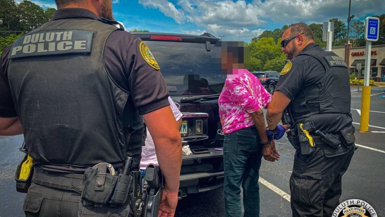 <div>The Duluth Police Department posted this photo of a woman being arrested after investigators say officers found a Red Snapper in her pants on June 18, 2024.</div> <strong>(Duluth Police Department)</strong>