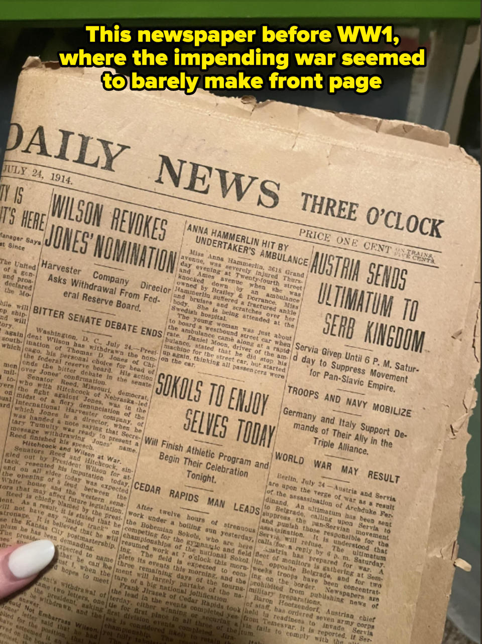 A close-up of a July 24, 1914, Daily News newspaper. Headlines include Wilson revoking Jones's nomination, Anna Hammerlin hit by an undertaker's ambulance, and Austria sending an ultimatum to Serbia