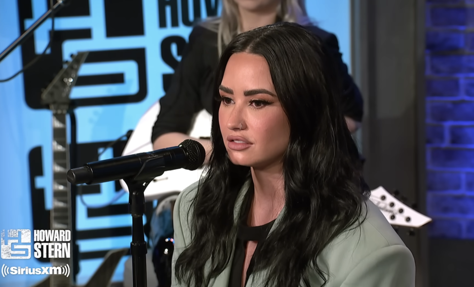 Close-up of Demi on the show