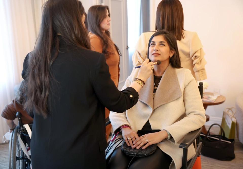 MAC Artist in the Green Room doing touch-ups at The Wrap's Power Women Summit, Maybourne Hotel, Beverly Hills, California on Dec 5, 2023.