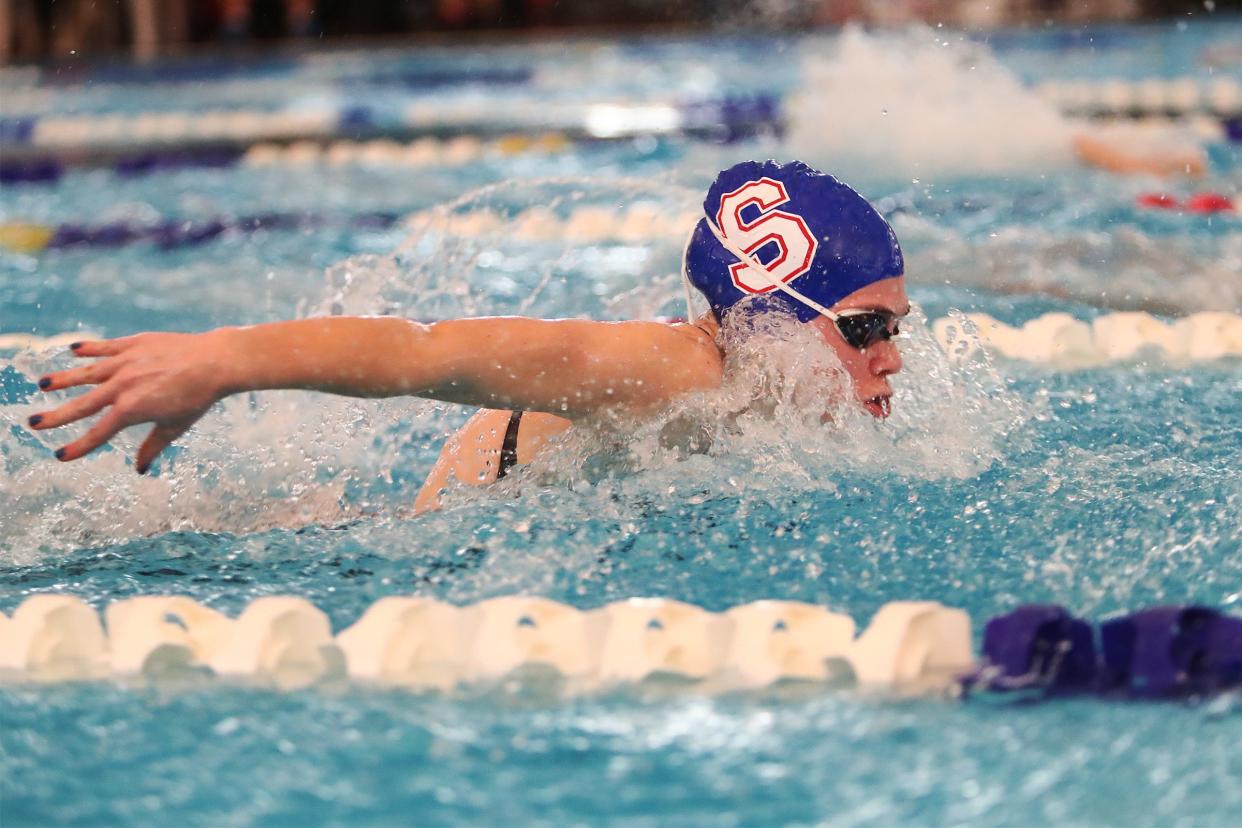 South Salem's Madelyn Spier competes in the 100-yard butterfly during the 6A-6 district swim meet in Bend on Feb. 12.