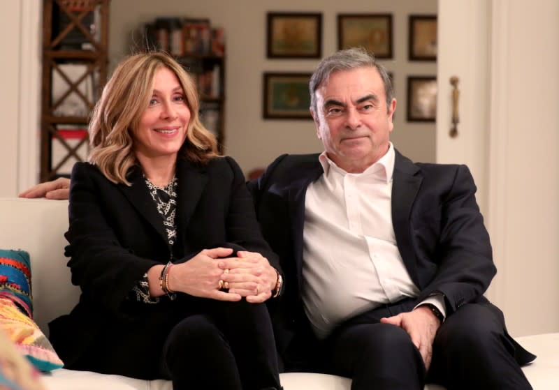 Former Nissan chairman Carlos Ghosn and his wife Carole Ghosn talk during an interview with Reuters in Beirut