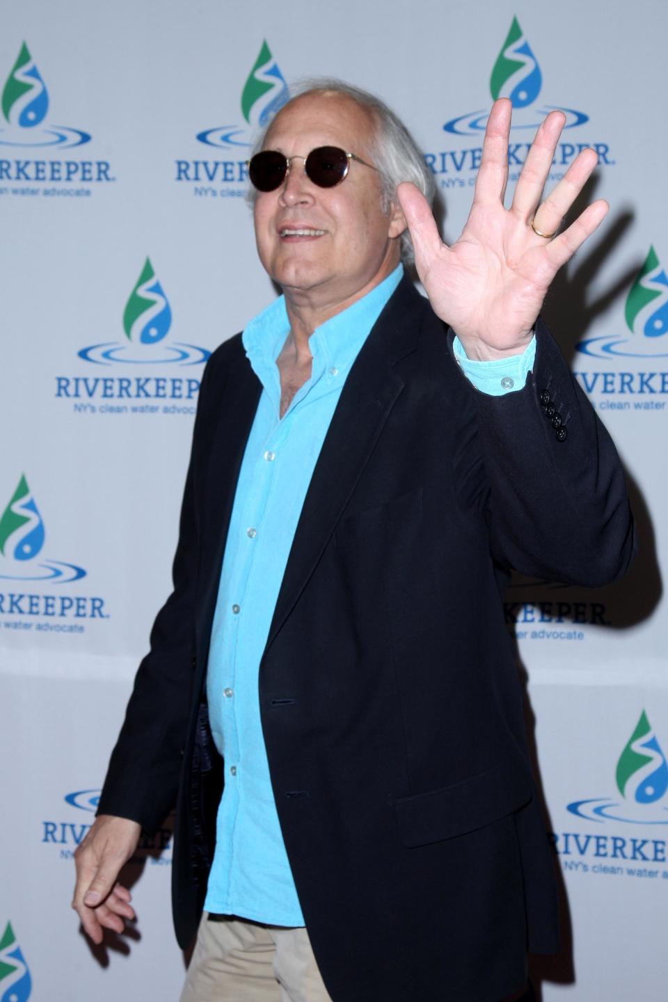 Chevy Chase waving