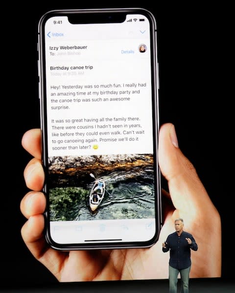 iPhone X has an edge-to-edge OLED screen  - Credit: AP 