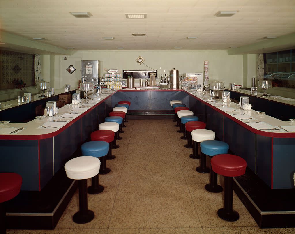 Red, white and blue stools at the Diplomat Motel Coffee Shop