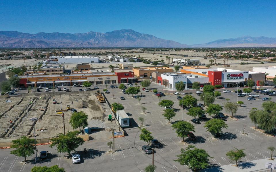 A Vallarta Supermarket, right, is one of the new retail businesses that have opened near Interstate 10 and Jackson St. in north Indio, Calif., Oct. 18, 2022.  New retail construction, left, will bring even more businesses to the area soon.