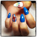 Celebrity photos: Lily Allen also got behind Team GB by having her nails painted in their honour. We especially love the nail with the Olympics rings on – too cute!