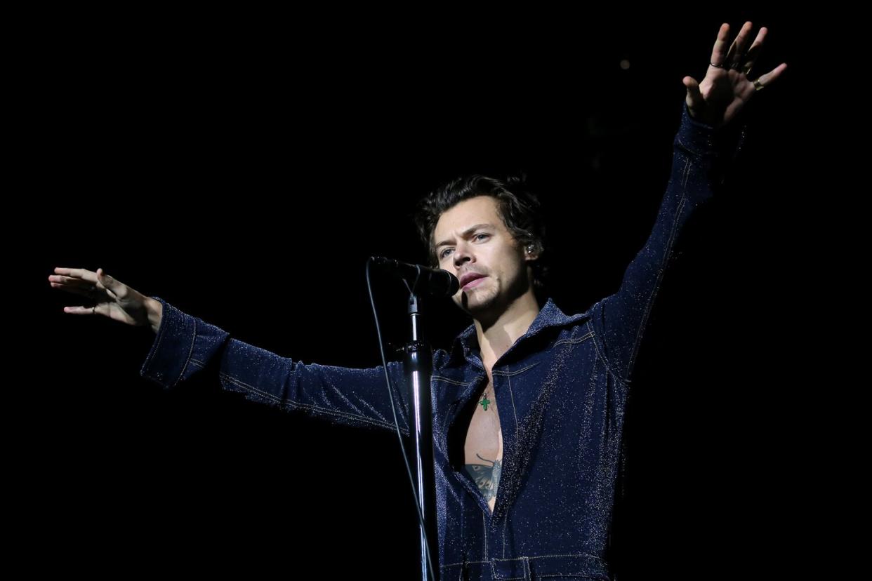 Harry Styles performs on stage during day one of Capital's Jingle Bell Ball