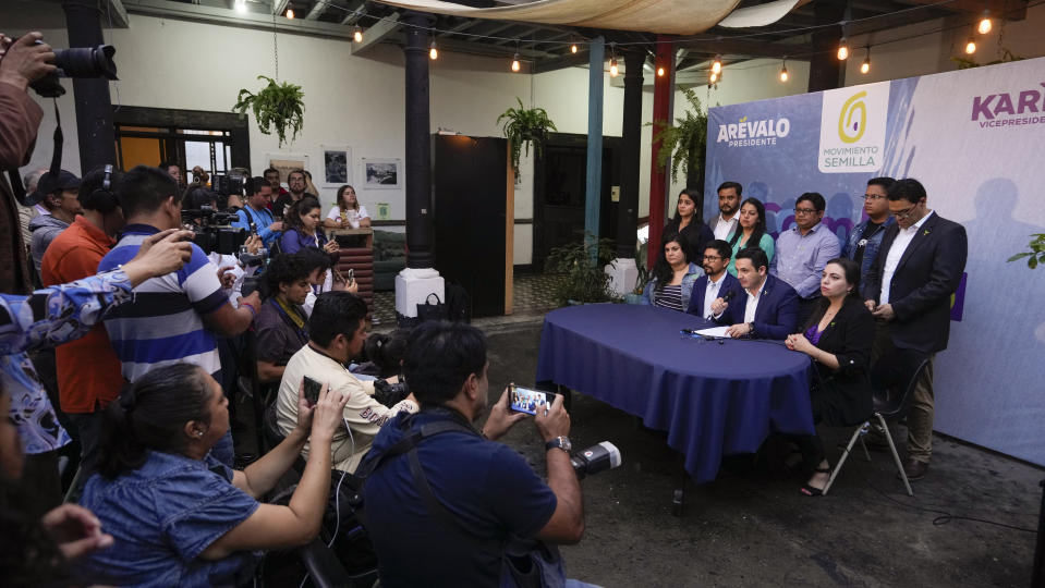 Seed Movement party lawmakers give a press conference in Guatemala City, Wednesday, Aug. 30, 2023. Guatemala's Congress has refused to recognize the lawmakers from the party of President-elect Bernardo Arévalo, following the suspension of his party earlier this week. (AP Photo/Moises Castillo)