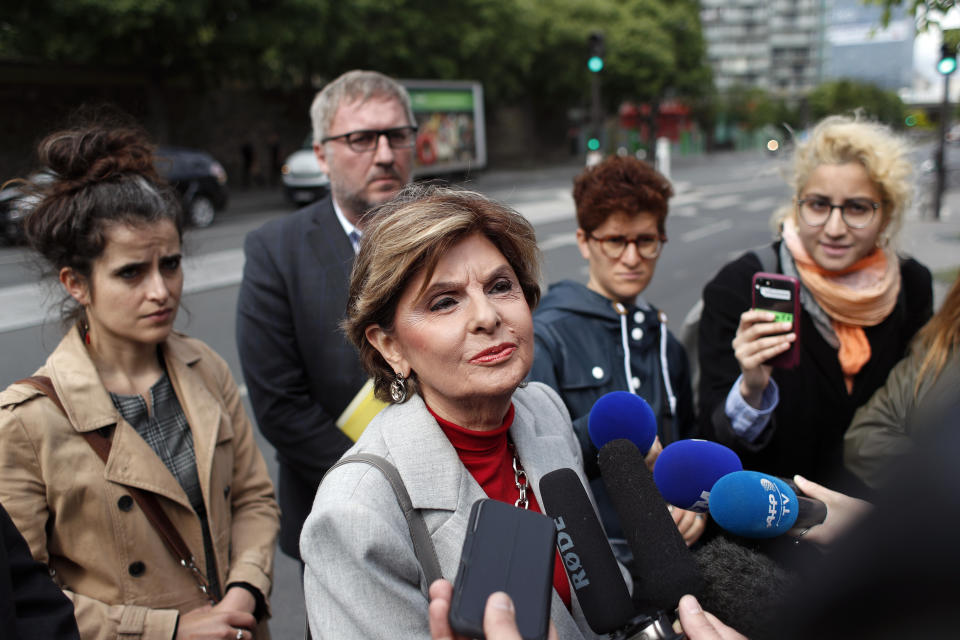 American lawyer Gloria Allred, center, gives a press conference, in Paris, Tuesday, May 28, 2019. The lawyer for a woman who filed a rape complaint in Paris against Chris Brown says the American rap artist "has thumbed his nose at and shown disrespect for the French legal system" after he did not attend a confrontation with the alleged victim Tuesday. (AP Photo/Thibault Camus)