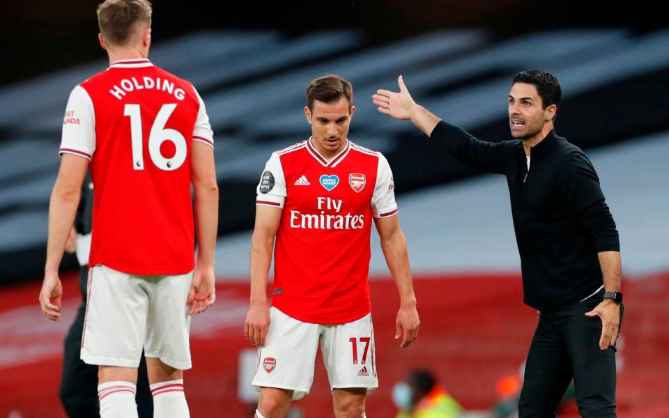 Arsenal receive instructions from manager Mikel Arteta - AFP