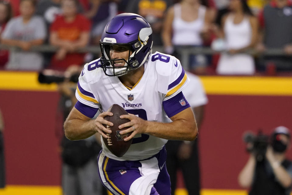 Minnesota Vikings quarterback Kirk Cousins drops back to pass during the first half of an NFL football game against the Kansas City Chiefs Friday, Aug. 27, 2021, in Kansas City, Mo. (AP Photo/Ed Zurga)