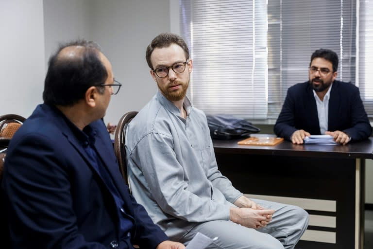 Swedish EU diplomat Johan Floderus (C), seen here at a court hearing in Tehran in December, was on his way home Saturday after Stockholm agreed a prisoner swap for a former Iranian official (Amir Abbas GHASEMI)