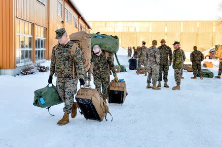 FILE PHOTO: U.S. Marines, who are to attend a six-month training to learn about winter warfare, arrive in Stjordal, Norway January 16, 2017. NTB Scanpix/Ned Alley/via REUTERS