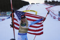 United States' Mikaela Shiffrin poses after winning the women's World Championship giant slalom, in Meribel, France, Thursday Feb. 16, 2023. (AP Photo/Alessandro Trovati)