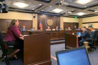 Democratic Rep. Brooke Green of Boise, far left, testifies before the Idaho legislature's ethics committee in a hearing Monday, Aug. 2, 2021, in Boise, Idaho, to determine if Rep. Priscilla Giddings, a Republican, acted inappropriately when she publicized the name and photo of a woman who said she was raped by another lawmaker. Green was one of about 25 lawmakers who signed on to ethics complaints against Giddings. (AP Photo/Rebecca Boone)