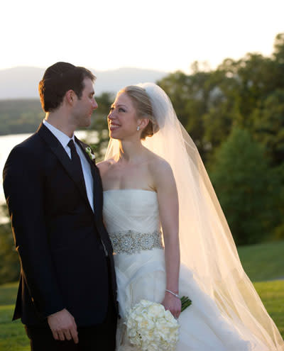 Chelsea Clinton: July 2010: Bill Clinton’s daughter and Marc Mervinsky married in Rhinebeck, NY. Chelsea’s Vera Wang gown was ivory, strapless with a draped bodice and featured a laser-cut swirling silk organza ball skirt and train. Photo Rex