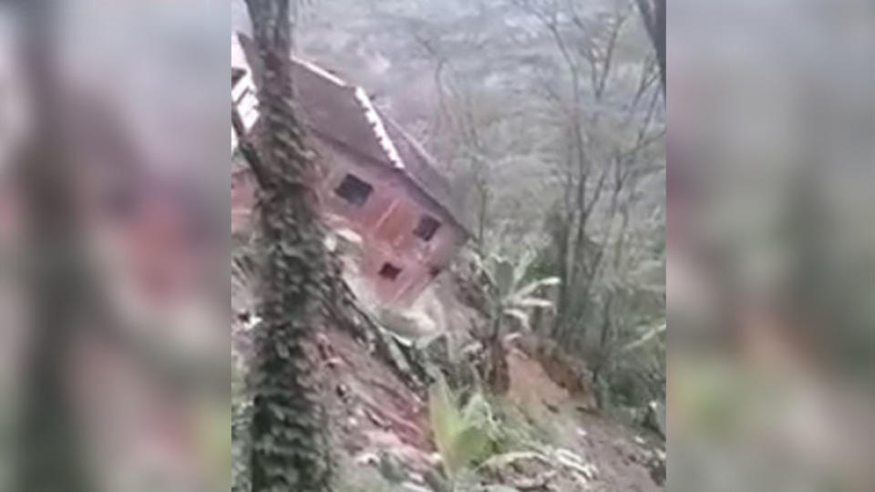 The house came crashing down a mountainside in Guayabetal after a mudslide. Source: CEN/Australscope