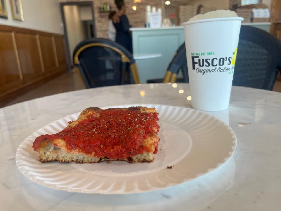 A slice of tomato pie from Nick's Pizza and a medium lemon water ice at Fusco's Water Ice at 3926 Kirkwood Hwy in Stanton. As seen May 2, 2024.