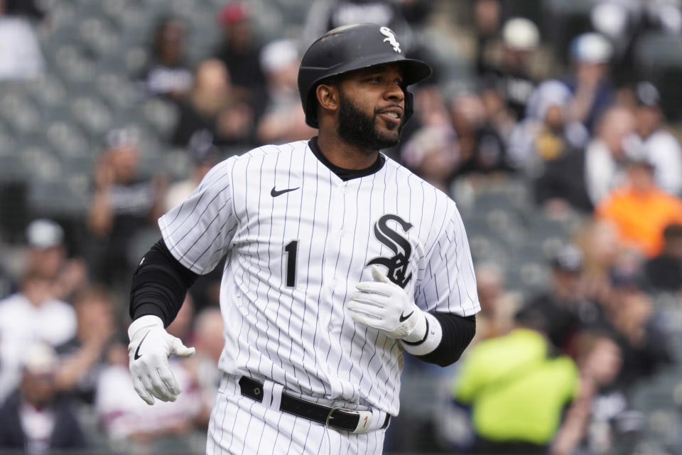 Chicago White Sox's Elvis Andrus runs to first base after hitting a single during the fifth inning of a baseball game against the San Francisco Giants in Chicago, Wednesday, April 5, 2023. It was Andrus' 2,000th career hit. (AP Photo/Nam Y. Huh)