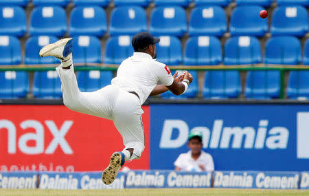 Cricket - Sri Lanka v India - Third Test Match - Pallekele, Sri Lanka - August 12, 2017 - Sri Lanka's Lahiru Kumara drops a catch hit by India's Lokesh Rahul. REUTERS/Dinuka Liyanawatte