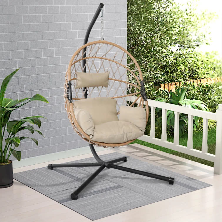 Careron Egg Chair with Stand. Image via Wayfair.