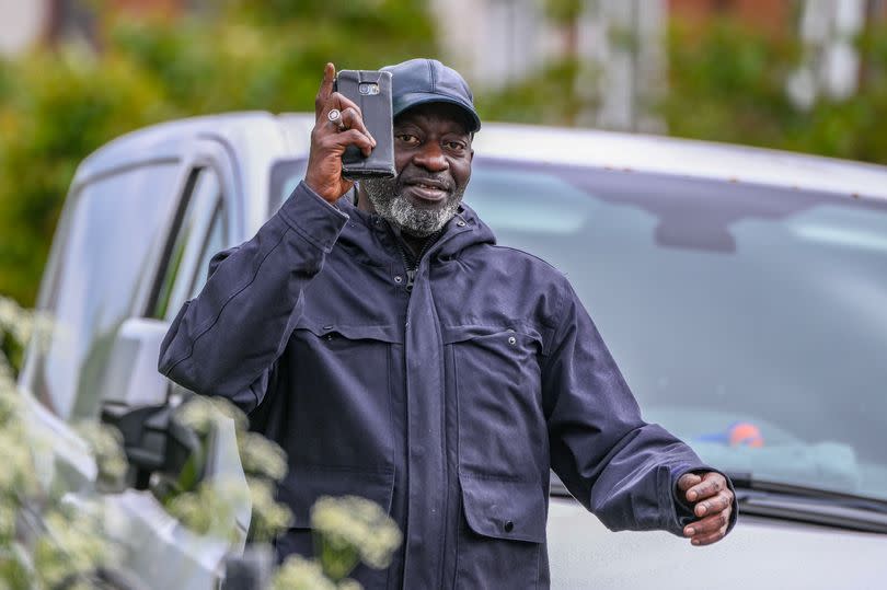 Alleged Gambian torturer Edrisa Jobe walking in Barlanark near his home.