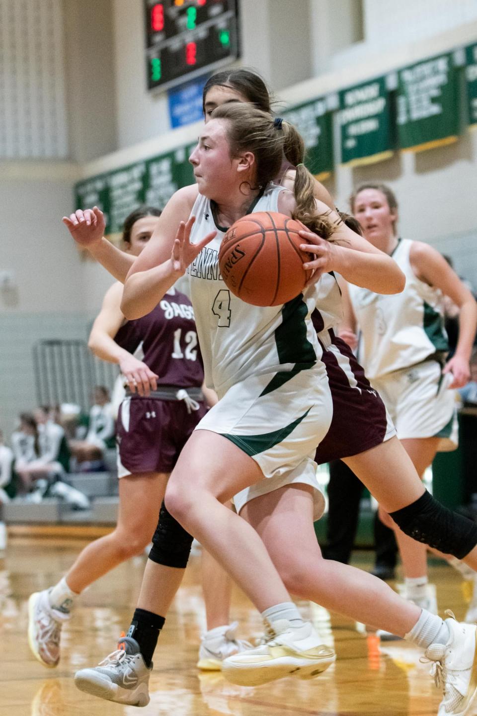 Pennridge's Katie Yoder drives to the basket in a District One Class 6A first round playoff game against Garnet Valley at Pennridge High School in Perkasie on Friday, February 17, 2023. The Jaguars defeated the Rams 45-42.