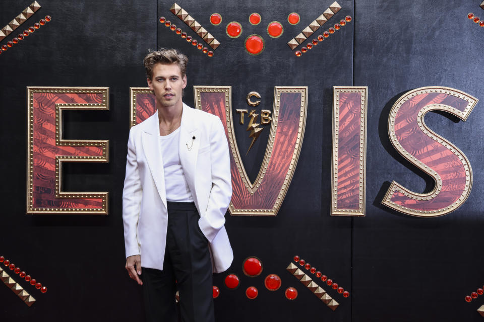 Austin Butler poses for photographers upon arrival for the premiere of the film 'Elvis' in London Tuesday, May 31, 2022. (Photo by Vianney Le Caer/Invision/AP)