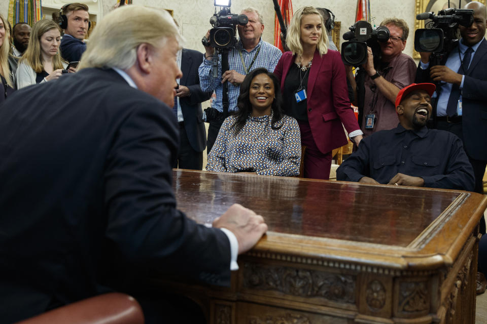 President Donald Trump meets with rapper Kanye West in the Oval Office of the White House, Thursday, Oct. 11, 2018, in Washington. (AP Photo/Evan Vucci)