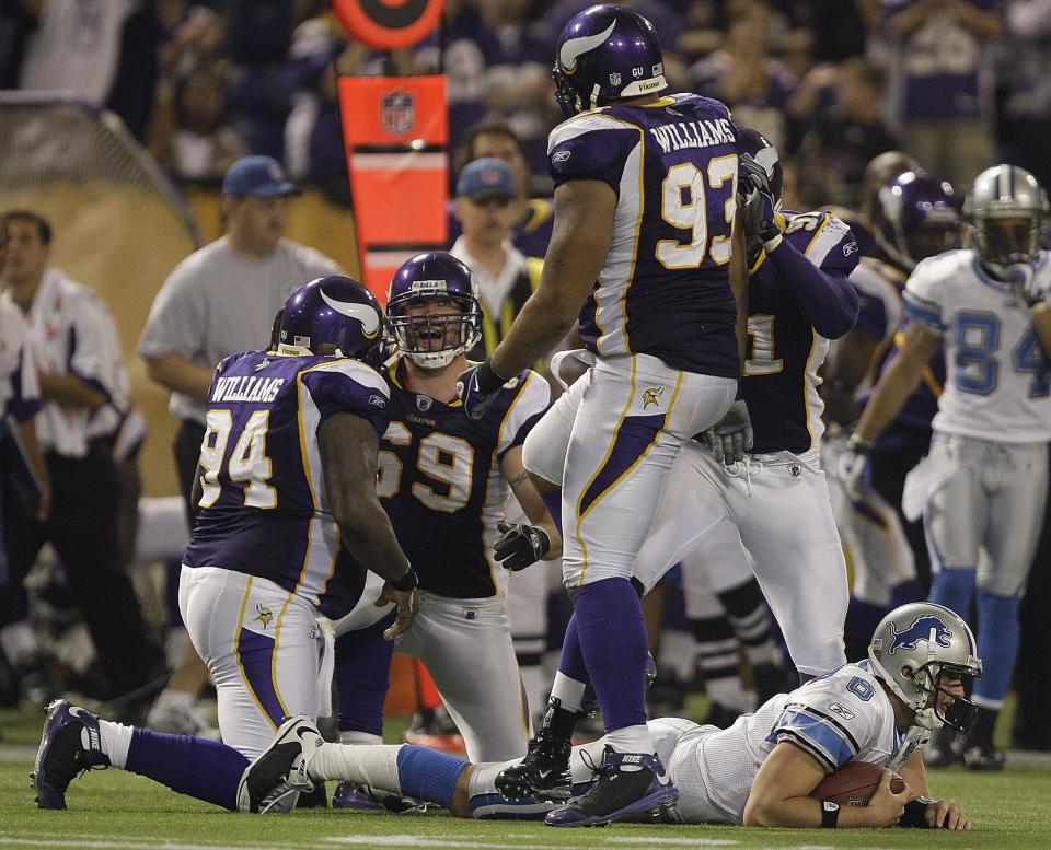 Lions quarterback Dan Orlovsky is sacked by the Vikings' Jared Allen and Pat Williams during the second half of the Lions' 12-10 loss on Oct. 12, 2008, at the Metrodome.