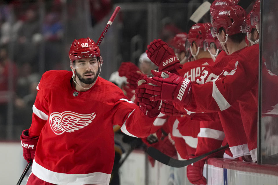 Detroit Red Wings defenseman Jake Walman (96) celebrates his goal against the St. Louis Blues in the first period of an NHL hockey game Thursday, March 23, 2023, in Detroit. (AP Photo/Paul Sancya)