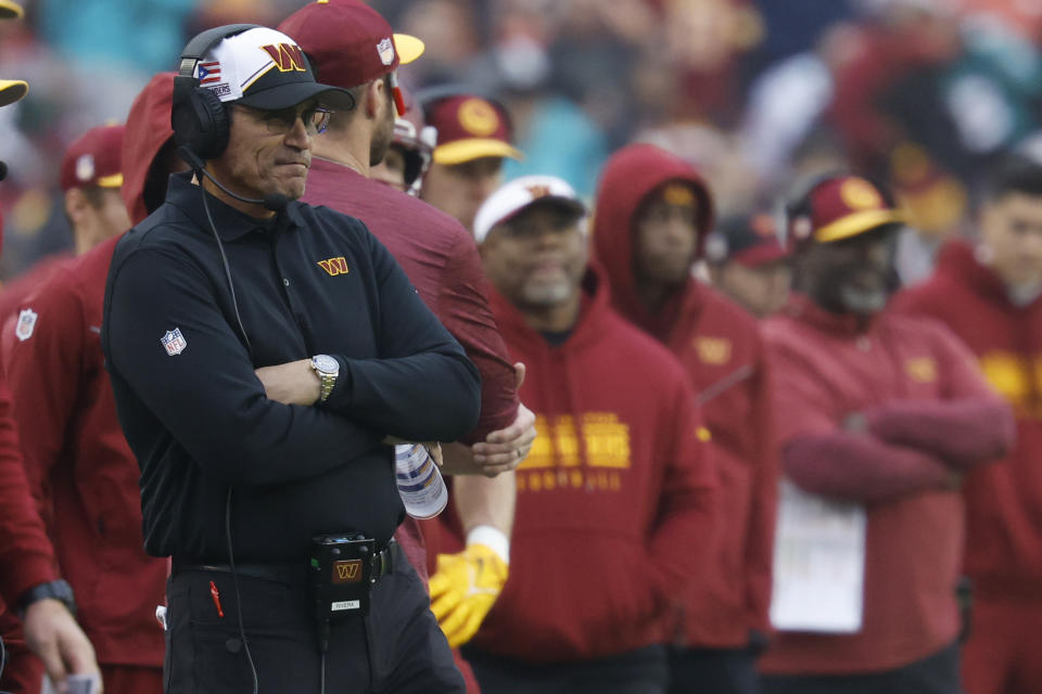 Dec 3, 2023; Landover, Maryland, USA; Washington Commanders head coach Ron Rivera (L) looks on from the sidelines against the <a class="link " href="https://sports.yahoo.com/nfl/teams/miami/" data-i13n="sec:content-canvas;subsec:anchor_text;elm:context_link" data-ylk="slk:Miami Dolphins;sec:content-canvas;subsec:anchor_text;elm:context_link;itc:0">Miami Dolphins</a> during the fourth quarter at FedExField. Mandatory Credit: Geoff Burke-USA TODAY Sports