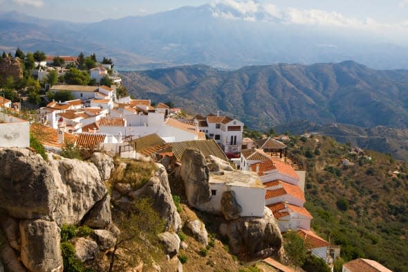 View of the mountain top Moorish village of Comares, Malaga province, Spain