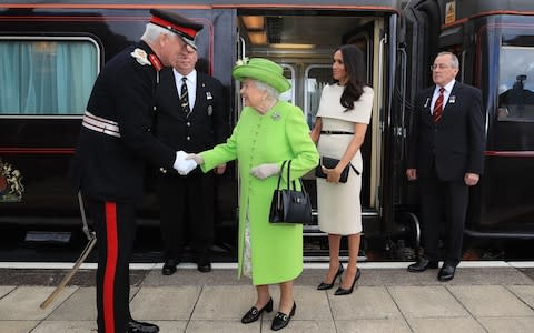 The Queen and Duchess departing the royal train  - Credit: PA 