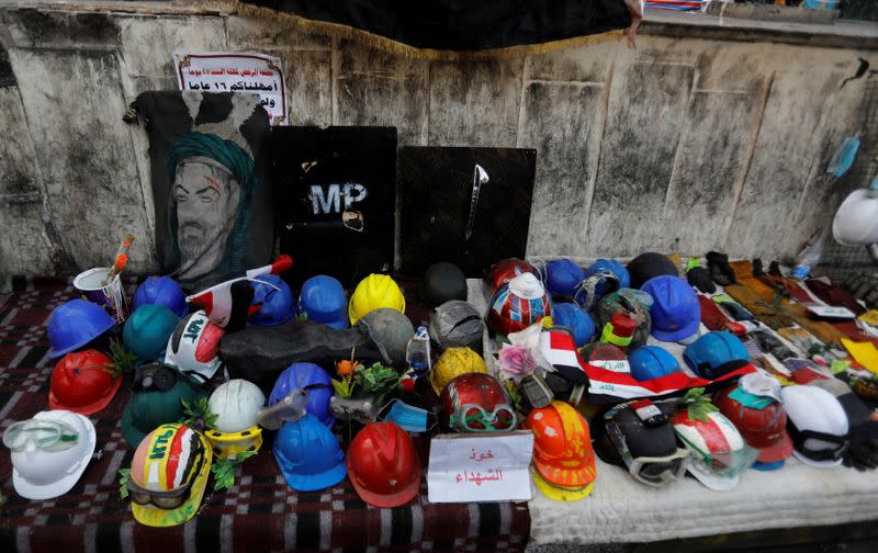 FILE PHOTO: A makeshift memorial with personal belongings of those who were killed at an anti-government protests is displayed at Tahrir Square in Baghdad