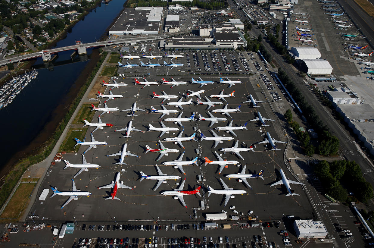 Grounded Boeing 737 MAX aircraft are seen parked in a storage lot and Boeing employee parking lot in an aerial photo at Boeing Field in Seattle, Washington, U.S. July 1, 2019. Picture taken July 1, 2019. REUTERS/Lindsey Wasson