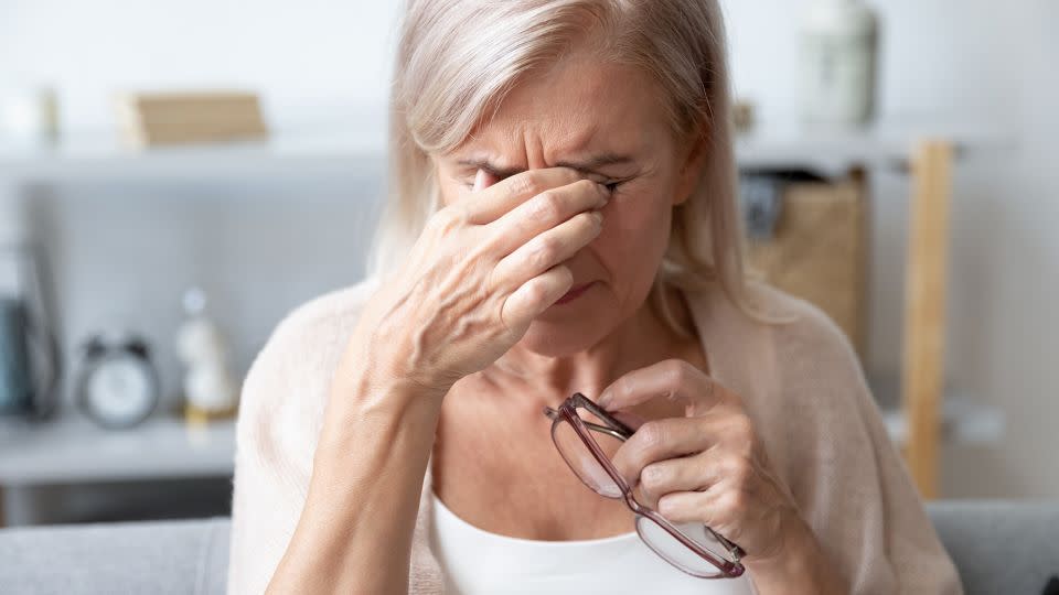 Vision loss, high cholesterol and infrequent social contact are three of the 14 risk factors that, when addressed, could help avoid or delay a dementia diagnosis, according to a new study. - fizkes/iStockphoto/Getty Images