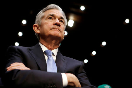 FILE PHOTO: Jerome Powell waits to testify before the Senate Banking, Housing and Urban Affairs Committee on his nomination to become chairman of the U.S. Federal Reserve in Washington, U.S., November 28, 2017. REUTERS/Joshua Roberts/File Photo