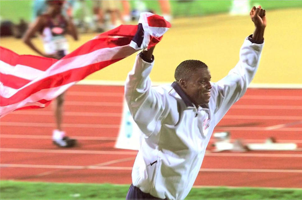 Lewis at the 1996 Summer Olympics. (Photo: JEFF HAYNES/AFP via Getty Images)