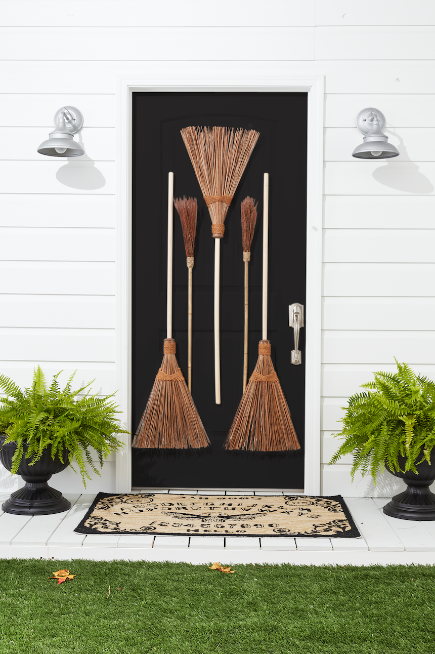 10) Witch Broom Door Decorations