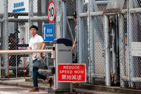 Former student leader Joshua Wong walks out from prison after being jailed for his role in the Occupy Central movement, also known as “Umbrella Movement”, in Hong Kong