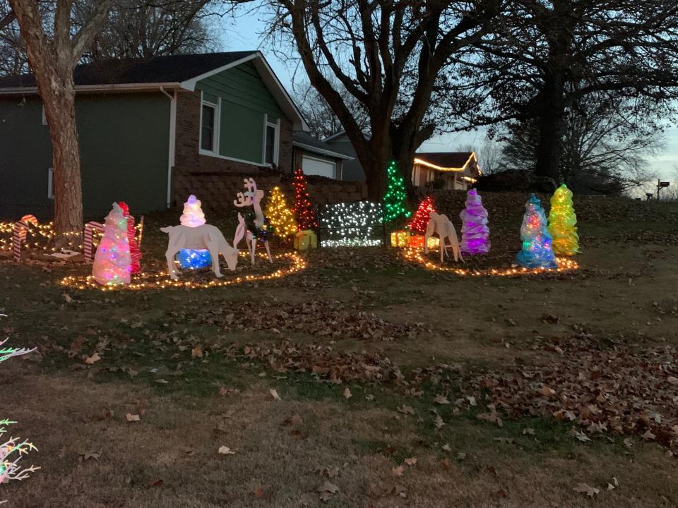 New to the Stones' display this year are three mega trees, one of which stands 20 feet tall and features 5,100 lights. The display also features a 12-foot Santa, a 10-foot reindeer and a Joy sign that stands 6 feet tall.